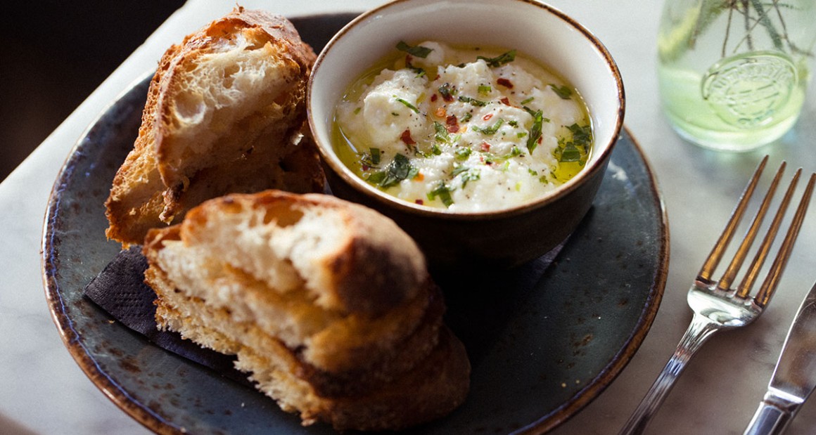 Ricotta with herbs and toasted bread. Photograph by William Hereford