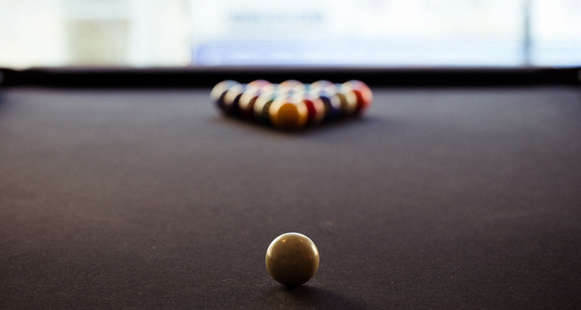 Getting ready for a game of pool. Photograph by William Hereford